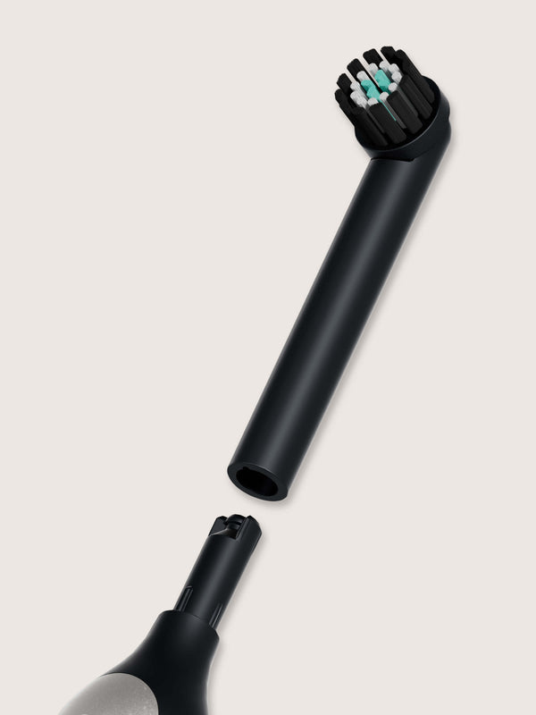 quip 360 oscillating toothbrush in color black.