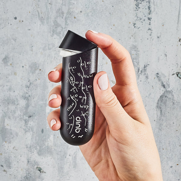 A model holds a quip gum dispenser- Shantell Martin Special Edition